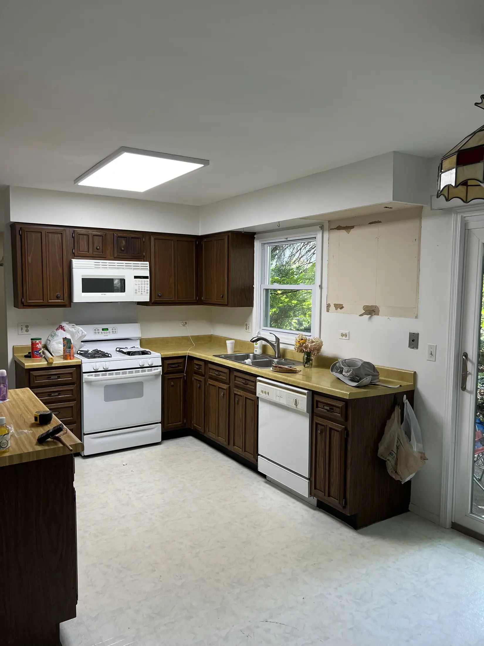 Corner view of the original kitchen layout before remodeling